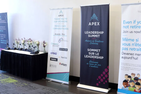 52952961745_0c5d654772_o Display of awards with five banners around from sponsors